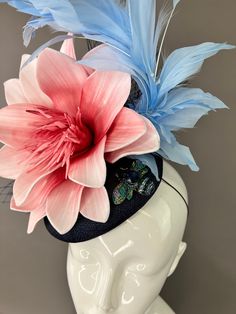 NAVY BLUE fascinator with baby blue floral spray and blush pink floral bloom. Attaches with elastic fascinator headband. One size fits all. Please note all sales are final. Please don’t forget to follow us on Instagram @TheHatHive Summer Blue Headpiece With Handmade Flowers, Spring Blue Mini Hats With Handmade Flowers, Adjustable Blue Headband For Spring, Blue Mini Hat Headband For Spring, Blue Spring Fascinator For Garden Party, Spring Blue Fascinator For Garden Party, Spring Adjustable Fascinator With Handmade Flowers, Spring Fascinator With Handmade Flowers, Handmade Flower Hair Accessories For Spring