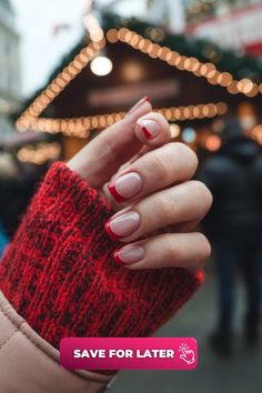 French tips are getting a holiday makeover with bright red tips on a nude base. This design is chic and classy, offering a modern twist on the traditional French manicure. The look is ideal for those who prefer something subtle yet stylish, proving that you don’t need much to make a big impression. Holiday Manicure, Red And Gold Nails, Christmas Nail Ideas, Red Tips, Classic French Manicure