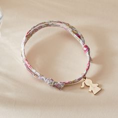 For the little one who is already growing up so fast, our Personalized Children’s Mini Girl Liberty Bracelet is the perfect keepsake to match with mummy’s Mini Family Liberty Bracelet. A keepsake they’ll treasure, each mini charm can be personalized with a hand-engraved name, and paired with a choice of five floral Liberty prints.18K Champagne Gold Plated, 925 Sterling Silver or 18K Rose Gold PlatedMini Girl: 0.47 x 0.31Liberty braid with fully adjustable sliding knot fasteningHand-engraved in o Adjustable Bracelet For Mother's Day Keepsake, Liberty Bracelet, Liberty Prints, Adjustable Sliding Knot, Mini Charm, Sliding Knot, Liberty Print, Champagne Gold, Personalised Kids