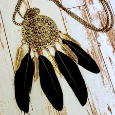 Southwestern Boho Feather Necklace In Aged Gold Tone Over Alloy Metal And Black Antiqued Accents. Long 26 Inch Chain With Lobster Clasp. Cute And Great For Multi-Layered Colorful Boho Accessories. Length: 26 Inches Black Feathered Jewelry For Festivals, Black Southwestern Necklaces For Festivals, Black Southwestern Necklace For Festival, Southwestern Style Black Necklace For Festivals, Southwestern Style Black Necklace For Festival, Southwestern Boho, Boho Feathers, Feather Necklace, Boho Accessories