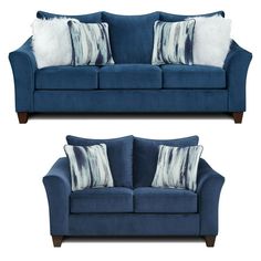 two blue couches with pillows on them and one in the same color, both facing each other