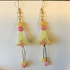 Super lightweight, these cute acrylic pink & yellow bell flower cap and crackle beaded pierced earrings remind me of a dancing fairy! Pair with that cute sundress or jeans & sandals. Whimsical Spring Flower Earrings With Ear Wire, Handmade Yellow Earrings For Spring, Cute Adjustable Flower Earrings For Spring, Cute Yellow Earrings For Spring, Whimsical Flower Earrings For Spring, Yellow Spring Earrings, Fun Pink Spring Jewelry, Casual Flower Earrings For Spring, Casual Spring Flower Earrings