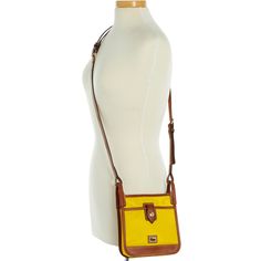 Minimalist Mix    This leather-trimmed nylon crossbody is designed for maximum comfort and convenience. A snap front pocket provides the perfect place for a phone or keys and the zip top keeps contents secure. Chic and lightweight, it strikes the perfect balance between style and function. Travel Shoulder Bag For Mobile Phone In Coated Canvas, Yellow Coated Canvas Shoulder Bag For Travel, Ticking Stripe, Dooney And Bourke, Travel Collection, Dooney & Bourke, Perfect Bag, Nylon Bag, Zip Top