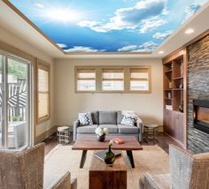 a living room filled with furniture and a sky painted on the ceiling over it's fireplace