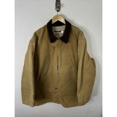 Vintage Tough Duck  Sherpa Lined Chore Jacket  Men Size 2XL  Made in Canada Canvas  Measures  Pit to pit 29 in  Shoulder to hem 36 in  Shoulder to shoulder 22.5 in  Shoulder to cuff 25.5 in  Condition Good, little bit of wear around cuff edge Winter Sport Coat With Corduroy Collar, Rugged Long Sleeve Winter Outerwear, Rugged Winter Outerwear, Rugged Long Sleeve Outerwear With Padded Collar, Utility Outerwear With Corduroy Collar For Outdoor, Vintage Sport Coat With Pockets For Cold Weather, Winter Outdoor Outerwear With Corduroy Collar, Winter Outerwear With Corduroy Collar For Outdoor, Vintage Outdoor Outerwear With Corduroy Collar