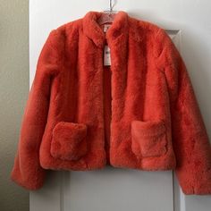 A Beautiful And Unique Bright Orange Faux Fur Jacket, Brand Nwt! Fully Lined. Front Pockets. Hook Closure. Measures 23 Inches Long And 19 Inches Across From Armpit To Armpit In The Back. Cold Weather Spring Fur Coat With Pockets, Spring Fur Coat For Cold Weather With Pockets, Fur Coat With Pockets For Cold Weather In Spring, Casual Faux Fur Outerwear With Pockets, Spring Faux Fur Outerwear With Pockets, Fall Faux Fur Outerwear With Pockets, Faux Fur Outerwear With Pockets For Fall, Casual Fur Coat With Faux Fur Trim For Spring, Spring Faux Fur Lined Outerwear For Work