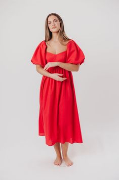 The Hamilton is everything you're looking for in a midi dress - charming, sophisticated, and absolutely flattering. It features premium quality details, like a sweetheart neckline and gorgeous balloon sleeves that can be worn on or off the shoulder. It's an unforgettable choice for every body type, and extra-comfy for expecting mamas! The best part? You can wear this beauty long after your sweet baby arrives! Available in multiple colorways. FIT: Runs true to size. Features a smocked back panel Red Midi Dress With Gathered Sleeves, Chic Red Puff Sleeve Midi Dress, Chic Red Midi Dress With Puff Sleeves, Fitted Bodice Midi Dress With Sweetheart Neckline For Brunch, Sweetheart Neckline Midi Dress With Fitted Bodice For Brunch, Sweetheart Neckline Midi Dress For Brunch, Red Puff Sleeve Dress For Summer Brunch, Knee-length Midi Dress With Gathered Sleeves For Date Night, Fitted Red Midi Dress With Gathered Sleeves