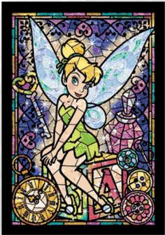 a stained glass window with a tinkerbell sitting on it's side and the words ebay below