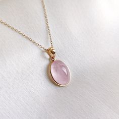 This stunning pendant is set in 14k Solid Yellow Gold with Natural Morganite with utmost precision. It is an unique gemstone pendant for nearly every occasion and is completely hassle-free jewelry. ITEM DETAILS: * Gem: Morganite * Gem Size: 10X13mm * Gem Shape: Oval * Gem Eeight: 6.46 carats * Gold Purity: 14KT * Gold Weight: 0.56 gram * Total Weight of the Pendant: 1.85 gram The Gold purity is guaranteed and it comes with authentic 14KT gold hallmark. Since my items are handmade, they are absolutely nickel and lead free. CUSTOMIZATION: * Gemstone customization is available and it can be substituted with a gem of your choice. Kindly message me for the same. PACKAGING * The Pendant comes with layers of safe and secure wrapping along with Free handmade jewelry box with every purchase. ➡️Head 14k Yellow Gold Gemstones For Gift, 14k Gold Oval Jewelry With Natural Stones, Gold Gemstone Jewelry With Rose Quartz, Yellow Gold Natural Stone Pendant Gemstones, Yellow Gold Pendant Gemstones With Natural Stones, Gold Jewelry With Rose Quartz Gemstone, 14k Yellow Gold Jewelry With Large Stone, 14k Gold Fine Jewelry With Large Stone, Yellow Gold Pendant Jewelry With Large Stone