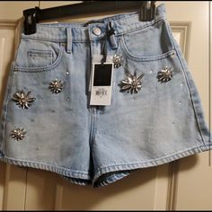 Juice Couture Jean Embellished Shorts Size 26 Trendy High Waist Embellished Bottoms, Trendy High Waisted Embellished Bottoms, Trendy Embellished Bottoms For Night Out, Chic Denim Shorts For Party, Casual High Rise Embellished Bottoms, Casual Embellished High Rise Bottoms, Embellished High Rise Bottoms For Spring, Chic Embellished Shorts, Chic Embellished Short Bottoms