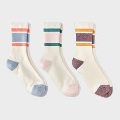 Give your feet easy comfort with the Women's Retro Striped Ribbed 3pk Crew Socks - Universal Thread™ 4-10. Perfect for lounging or staying warm on chilly days, these socks are soft and provide a snug fit. With 3 pairs in each pack, you’ll have the perfect blend of warmth and comfort. Experience cozy feet every day with these essential crew socks. Universal Thread™: Found exclusively at Target. Ribbed Crew Socks, Camp Couture, Sneaker Socks, Socks Sneakers, Sock Packs, Cozy Socks, Striped Socks, Tube Socks, Athletic Socks