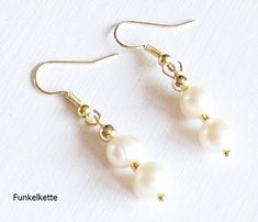 Enchanting shimmering freshwater pearls white on gold ear hooks, beautiful! Suitable for a fence bride or for festive occasions. Also very nice to give away created and handmade by Funkelkette 8063 Due to the small business status according to § 19 UStG, I do not charge VAT and therefore do not show them Tax No.43/103/02223 White Pearl Chain Earrings With Round Beads, Gold Pearl Earrings With Round Beads, Hypoallergenic Round Pearl Beads Earrings For Wedding, Adjustable White Pearl Earrings With Round Beads, White Round Beads Pearl Earrings For Wedding, White Pearl Earrings With Round Beads For Wedding, White Round Pearl Earrings For Wedding, White Pearl Earrings For Wedding With Round Beads, Hypoallergenic White Pearl Earrings With Round Beads