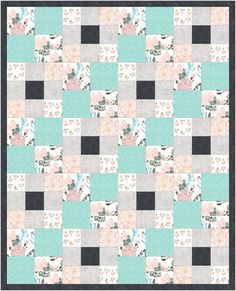 a patchwork quilt with flowers and leaves in pastel blue, grey, pink, black and white colors