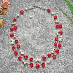 "MY GEMS ROCK -19.25\" length -Firecracker freshwater pearls and sea bamboo coral/color treated. -Wire-wrapped on a non-tarnish wire -Double Strand -Sterling silver clasp and extender https://www.etsy.com/shop/MYGEMSROCK" Red Double Strand Gemstone Bead Necklaces, Handmade Red Coral Pearl Necklace, Adjustable Red Pearl Necklace, Red Pearl Necklace With Gemstone Beads, Red Polished Pearl Necklace, Red Pearl Necklace With Polished Round Beads, Red Coral Double Strand Necklace, Double Strand Red Coral Necklace, Red Pearl Beaded Necklace With Round Beads