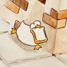 a drawing of a duck on the ground next to a brick wall and some bricks