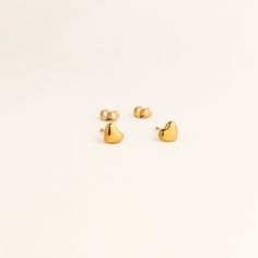 Add a touch of love to any outfit with our Small Heart Studs. These playful earrings are a subtle and stylish way to show your sweet side. Perfect for everyday wear or dressing up, these studs will surely put a smile on your face (and maybe even someone else's too!) Cheap Dainty Heart Earrings For Pierced Ears, Valentina Rose, Playful Earrings, Friendship Rings, Mini Earrings, Heart Stud Earrings, Bead Charm Bracelet, Mini Heart, Gold Stud