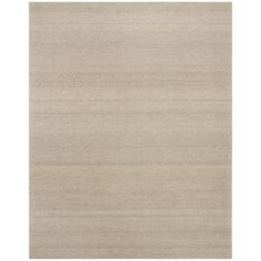 a beige rug with horizontal stripes on the bottom, and an uneven pattern in the middle