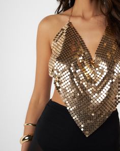 Gold shiny chainmail V-neck top V-neck Shimmer Tops For Party Season, Metallic Sequin Crop Top For Party Season, Glamorous Metallic Shimmer Tops, Gold Crop Top For Club Party, Gold Crop Top For Club And Party Season, Gold Crop Top For Party Season, Metallic Embellished Tops For Party, Metallic Shiny Top For Party Season, Chic Metallic Tops For Club