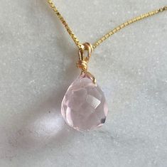 This is one of my classical pieces. I make this for my family and loved ones. And I wear one everyday. I designed this with a very delicate chain, so the rose Quartz looks as if it is just a sparkle floating on your skin. Rose Quartz is the stone of unconditional love, self love, universal love. Rose Quartz is the stone of universal love.  It restores trust and harmony in relationships, encouraging unconditional love. It purifies and opens the heart at all levels to promote love, self-love, frie Feminine Rose Jewelry For Valentine's Day, Pink Sterling Silver Jewelry, Tarnish Resistant, Dainty Rose Gold Jewelry Si Clarity, Classic Pink Drop Jewelry, Everyday Rose Gold Teardrop Jewelry, Feminine Rose Jewelry For Gifts, Elegant Rose Quartz Yellow Gold Jewelry, Elegant Yellow Gold Jewelry With Rose Quartz, Adjustable Rose Quartz Rose-colored Jewelry