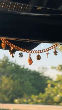 Add some ✨charm✨ to your car in a minimalist yet personalized way! Each Car Charmie (or Carmie) comes with 7 charms of your choice. Please make note of desired charms! Due to the random nature of rearview mirror styles, your Charmie will be shipped with a piece of thick wire to use as a hanger that can conform the necessary position. Decorating Inside Of Car, Car Decor Aesthetic, Blue Bronco, Boho Car Decor, Car Organization Ideas, Car Mirror Decor, Car Mirror Accessories, Car Mirror Decorations, Rearview Mirror Decoration