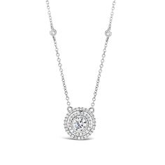 This 18K gold necklace features a 0.45 ct round brilliant-cut diamond accented by a double halo of prong-set diamonds and two bezel-set diamonds along the chain, making for a beautiful, delicate piece. -18k gold weighing 3.31 grams -50 round diamonds totaling 0.29 carats -1 round diamonds 0.45 carats (G-color, VS1 clarity) Available in yellow, white, & rose gold. Please allow 4-6 weeks for delivery if item is not in stock. Item no. N10281 Diamond Engagement Rings Cushion, Cushion Halo Engagement Ring, Diamond Bar Necklace, White Gold Pendant Necklace, Round Halo Engagement Rings, Chain Making, Halo Necklace, Bezel Necklace, Caligraphy Art