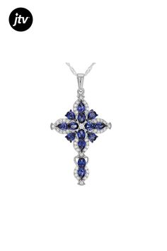 Bella Luce�� Esotica��� tanzanite and white diamond simulants 3.60ctw pear, oval, and round, rhodium over sterling silver cross pendant with chain. Pendant measures approximately 1.50" L x 0.94" W and has a 3mm bail opening. Includes a 18.00" L x 0.03" W that has a 2" extender and lobster claw clasp closure. White Gold Tanzanite Jewelry In Pear Shape, Sterling Silver Cross Pendant, Silver Cross Pendant, Pendant With Chain, Diamond Simulant, Sterling Silver Cross, Chain Pendant, Silver Cross, White Diamond