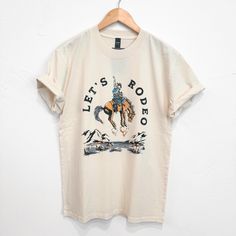 Let's Rodeo Unisex/Mens Tee - Faded Ecru - The Montana Scene Kids Onesies, Kids Beanies, Sock Gifts, Kid Tees, Heavy Weight, Mens Tees, Rodeo, Womens Tank, Kids Hoodie