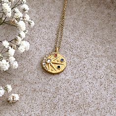 Sun and Moon Coin Necklace Decorated with Zircon  Plated 18K Gold Vermeil ☾ ﾟ｡⋆ Details ⋆｡ ﾟ☾ Charm diameter: 2.5cm. Chain size: 40cm + 5cm Our sun and moon necklace has colorful cubic zirconium crystals and an embossed hammer finish. Our unique design is sure to accentuate your personal style.  ☾ ﾟ｡⋆ How to care for your jewellery ⋆｡ ﾟ☾ Although our jewellery is made of high quality alloy with 18k gold plated materials made to last, to ensure longevity we recommend the following care tips: ● Av Necklace Sun And Moon, Sun And Moon Pendant, Power Of Attraction, Necklace Sun, Sun And Moon Necklace, Sun And Moon, Coin Necklace, Moon Pendant, Moon Necklace