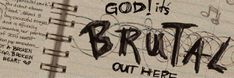 graffiti written on the side of a wall next to a notepad with writing that says god's brut out here