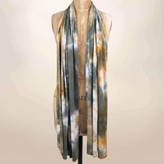 Our Hand Tie-Dyed Scarf/Turban/Body Wrap is a multi-functional piece that can be worn as a scarf, head wrap, shawl, cape, chunky scarf, turban, skirt, sarong, beach cover up. One of a kind Exclusive Handmade Rayon/Spandex and available in 3 colors One Size Fits Most (82"L, 24"W) Hand Wash Cold, Line Dry Bohemian Hand Dyed Scarves For Summer, Bohemian Hand-dyed Scarves For Summer, Bohemian Spring Wrap Scarves, Bohemian Tie-dye Scarves, Bohemian Tie Dye Scarves, Bohemian Hand Dyed Scarves For Spring, Bohemian Hand-dyed Scarves For Spring, Bohemian Hand Dyed Spring Scarves, Summer Hand-dyed Tie-dye Scarves