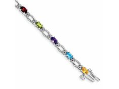 Rhodium over 14k white gold 0.104 cttw diamond and 3.25 cttw rainbow gemstone bracelet. Measures approximately 1/8 of an inch in width and has a box catch closure. Silver Multi-stone Diamond Bracelet, Fine Jewelry Silver Diamond Bracelet With Multi-stones, Rainbow Gemstones, Peridot Gemstone, Garnet Gemstone, Topaz Gemstone, Amethyst Gemstone, Cultured Pearls, Gemstone Bracelet