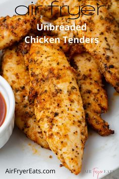 grilled chicken tenders on a plate with dipping sauce