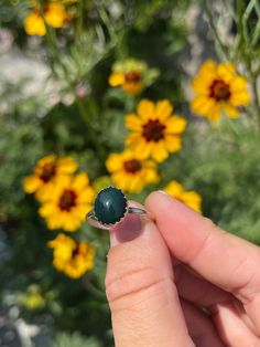 Bloodstone is a gemstone that activates our inner strength and courage that is normally hidden behind fear. It acts as a purification system for negative energy to change into positive ones! It's a stone used for healing anything in the body focused on the organs & blood! Metaphysical Properties: 1. Cleansing 2. Motivation 3. Consciousness  4. Action 5. Altruism 6. Grounding Energy 7. Protection 8. Manifesting Energy 9. Personal Power Chakra: Root Zodiacs: Aries, Libra, & Pisces This sterling silver ring was handmade by Holly from Tumbled Shop. She used a deep green Bloodstone crystal in an oval serrated edge bezel cup setting. Handmade with .925 + .99 sterling silver.  This listing for one (1) Bloodstone Ring exclusively from Tumbled Shop! Handmade with love in Amesbury, Massachusetts!  T Spiritual Oval Crystal Ring With Natural Stones, Spiritual Healing Rings With Natural Stones, Spiritual Turquoise Ring For Healing, Spiritual Oval Crystal Ring With Large Stone, Spiritual Turquoise Ring With Natural Stones, Spiritual Turquoise Ring For Anniversary, Spiritual Healing Rings, Spiritual Round Crystal Healing Ring, Green Crystal Healing Ring