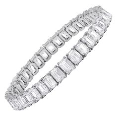 31 Exceptional Emerald Cut Diamonds set in one timeless bracelet, with 316.33 Carats of Emerald Cut Diamonds, each diamond is GIA Certified. D E F in Color ( colorless) VVS1-VVS2 in Clarity. Diana M. is a leading supplier of top-quality fine jewelry for over 35 years. Diana M is one-stop shop for all your jewelry shopping, carrying line of diamond rings, earrings, bracelets, necklaces, and other fine jewelry. We create our jewelry from gemstones and diamonds of the highest quality (GIA certified Platinum Bracelets For Men, Bracelets Tennis, White Diamond Jewelry, Bridal Diamond Necklace, Bling Ideas, Expensive Diamond, Platinum Bracelet, Expensive Jewelry Luxury, Bracelet Tennis