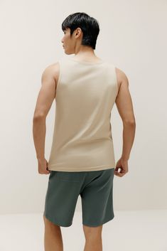 Replenish your underwear drawer with top-quality essentials like our ultra-soft Undershirt Tank — effortlessly comfortable, this versatile base layers perfectly with flannels, jackets, and more! Details Materials & Care Shipping & Returns • Your 24/7 tank top features a classic round neckline. Size M is 24.7" in length.• Minimalist design with understated solid colors.• Crafted from a blend of cotton & Spandex that keeps skin clean, dry, and healthy. • Material: 94% cotton, 6% Spandex.• Care ins Mens Undershirts, Color Crafts, Clean Skin, Base Layer, Cotton Spandex, Black Cotton, White Cotton, Round Neckline, One Shoulder Blouse