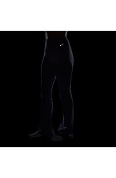 These subtly flared leggings boast signature moisture-wicking tech to keep you moving comfortably. 32" inseam, 19" leg opening; 9 1/2" front rise; 13" back rise (size Medium) Elastic waist Dri-FIT moisture-wicking technology 63% nylon, 37% spandex Machine wash, line dry Imported Flare Stretch Bottoms For Sports, Athleisure Flared Sports Bottoms, Flare Sports Bottoms, Athleisure Flare Bottoms For Sports, Flare Athleisure Bottoms For Sports, Flared Athleisure Bottoms For Sports, Black Flare Activewear For Workout, Sporty Flare Pants For Sports, Sporty Flared Workout Bottoms