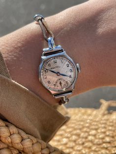 Rare Vintage Ladies 1950s Mid Century Silver Steel Round Case Ladies Subdial Wristwatch With Tan Cord & Leather Strap By Rotary Here we have a charming little wristwatch from the early 1950s, A beautiful elegant silver steel  case with a cord and leather strap.  The face is in good condition considering the old age, there is some light scuffs and marks as to be expected . this just adds charm and character  Some discolouration to the tan cord strap. see images    Watch has classy, minimalist bla Vintage Watches With Bracelet Strap For Everyday Use, Vintage Watch Bracelet Strap As Gift, Vintage Watch Accessories With Bracelet Strap For Everyday Use, Vintage Watch Accessories With Bracelet Strap For Gift, Vintage Silver Watches For Everyday Use, Vintage Silver Watch Accessories, Vintage Ladies 1950s, Classy Minimalist, Blue Hour