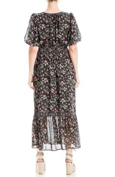 A delightful print decorates this flowy midi dress fashioned with a smocked waist. 51 1/2" length (size Small) Split neck with ties Short sleeves Lined 100% polyester Machine wash, line dry Imported Flowy Smocked Midi Dress For Daywear, Flowy Smocked Midi Dress With Elastic Waistband, Black Dress With Flowy Skirt And Short Sleeves, Elegant Black Dress With Short Sleeves And Flowy Skirt, Floral Print Midi Smocked Dress For Daywear, Floral Print Midi Length Smocked Dress For Daywear, Flowy Knee-length Midi Dress With Smocked Cuffs, Flowy Midi Dress With Smocked Cuffs, Bohemian Smocked Midi Dress For Daywear