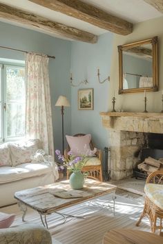 Soft pastel French farmhouse living space featuring dusty blue walls and vintage-inspired decor Soft Blue Living Room Walls, Blue French Country Living Room, Cottage Homestead, 2025 Manifestation, Blue French Country