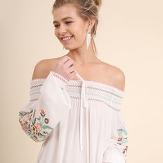 Umgee Boho Off-White Embroidered Off Shoulder Tunic Top Beautifully Detailed Embroidered Bohemian Top By Umgee Usa, This Fashion Statement Top Features A Beautifully Smocked Off The Shoulder Neckline. Gorgeous Embroidered Sleeve Details Material Is A Light And Gauzy Soft Cotton Blend. Hand Wash Cold Water; Hang To Dry Model Is 5' 8" Wearing A Small; See Chart For Measurements Spring Bohemian Smocked Top With Smocked Cuffs, Spring Embroidered Off-shoulder Blouse, Bohemian Smocked Top With Smocked Cuffs For Spring, Spring Off-shoulder Embroidered Blouse, Embroidered Off-shoulder Blouse For Spring, Bohemian Smocked Top For Brunch, White Embroidered Off-shoulder Top, Spring Multicolor Embroidered Peasant Top, Bohemian Smocked Top For Day Out