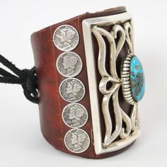 Sterling Silver Ketoh (Bow Guard) Bracelet on Brown Leather with Mercury Dimes and Natural Persian Turquoise set into Sawtooth Bezels. 4” Cuff Width7" Total Circumference Persian Turquoise, Zuni Jewelry, Navajo Rugs, Concho Belt, Navajo Jewelry, Native Jewelry, Pendant Rings, Black Stone, Antique Jewelry