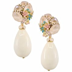 These special earrings by DUBLOS are stunningly sweet. And while they are smaller than most of our DUBLOS collection, they still have that signature amount of intricate detail that makes them stand out just as much as their statement earrings. Elegant, understated, stunning....and we think perfect for a bride too! 2.5"L X 1"W Swarovski crystals and strass, hand painted flower detail, hollow enamel plated tear drop element Omega Pierced backs, Light weight Handmade in Seville, Spain More about DU Spanish Jewelry, Filigree Pendant Necklace, Cream Flower, Flower Drop Earrings, Iridescent Green, Cats Eye Stone, Bronze Ring, Open Bangle, Artisan Earrings