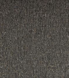 an upholstered fabric textured with small dots