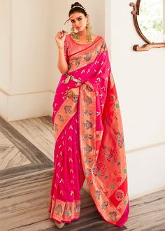 Turn heads in the captivating Hot Pink Paithani Silk Saree, a timeless embodiment of Indian tradition. This exquisite saree is adorned with delicate motifs, exuding an aura of refinement and grandeur. The intricately woven traditional Paithani Border and Pallu add a touch of opulence, lending a regal and ethereal look. Elevate your ethnic wardrobe and experience the joy of draping a saree that celebrates Indian elegance and femininity. Occasion: Wedding Wear, Party Wear, Festive Wear, Engagement Saree For Engagement, Art Silk Sarees, Wear Saree, Work Sarees, Pink Art, Soft Silk Sarees, Traditional Sarees, Pink Saree, Silk Material