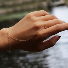 "Gorgeous ring hand chain bracelet! Looks great layered or by itself. This bracelet can be made sterling silver or 14K gold filled. *Select your wrist measurement for the length. ❤ Bracelet LENGH: This BRACELET can be made at any length from 5 - 9 inches and also includes 1/2 \" extender chain. This bracelet is measured from end to end including the clasp. Choose your length from drop box, or leave a note at Checkout. Child-Youth: 5-6 inches X-Small: 6 inches Small: 6.5 inches Medium: 7inches La Finger Bracelets, Hand Chain Bracelet, Real Gold Jewelry, Gorgeous Ring, Drop Box, Ring Hand, Chain Bracelets, Belly Chain, Hand Chain