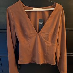 Deep V Long Sleeve Blouse. Great Style Just Ended Up Never Pulling It From My Closet Fitted V-neck Brown Blouse, Brown V-neck Top For Work, Fitted Brown V-neck Blouse, Chic Fitted Orange Blouse, Orange Long Sleeve Blouse For Work, Chic Orange Long Sleeve Blouse, Chic Orange Fitted Blouse, Fitted Long Sleeve Top For Brunch In Fall, Fitted Orange Blouse For Fall