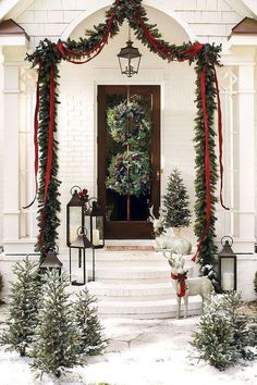 a christmas porch decorated for the holiday season