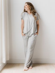 Super-cute, ultra-comfy nursing pajamas. This short-sleeve nursing & maternity pajama set will be your new fave whether you’re pregnant or postpartum. The double-layer design of the nursing pajama top features two outer panels that cross and an inner layer with side openings for easy pumping & nursing access. No more fumbling with clasps, hooks, or zippers during those middle-of-the-night feeds!   Soft, lightweight, breathable fabric  Loose-fitting, full-length pajama pants  Comfortable, wide wa Maternity Pajama Set, Tulip Top, Nursing Pajama Set, Maternity Nursing Pajamas, Nursing Pajamas, Nursing Maternity, Maternity Pajamas, Nursing Pads, Breastfeeding And Pumping