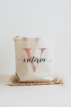 a canvas bag with the word victoria written on it