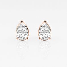 There's nothing more versatile than a pair of classic stud earrings. We love these princess cut lab grown diamond studs for every occasion, be it zoom meetings, brunch with friends or quiet evening dinner with your beau. Pick the size and color best suited to your ears in the color of gold that you fancy. Gia Certified Classic Teardrop Diamond Earrings, Classic Gia Certified Teardrop Diamond Earrings, Classic Teardrop Gia Certified Diamond Earrings, Classic Gia Certified Teardrop Earrings, Classic Teardrop Earrings Gia Certified, Rose Gold Pear-shaped Earrings For Anniversary, Classic Pear-shaped Diamond Earrings, Classic Rose Gold Teardrop Earrings, Timeless Pear-shaped Diamond Earrings For Gift